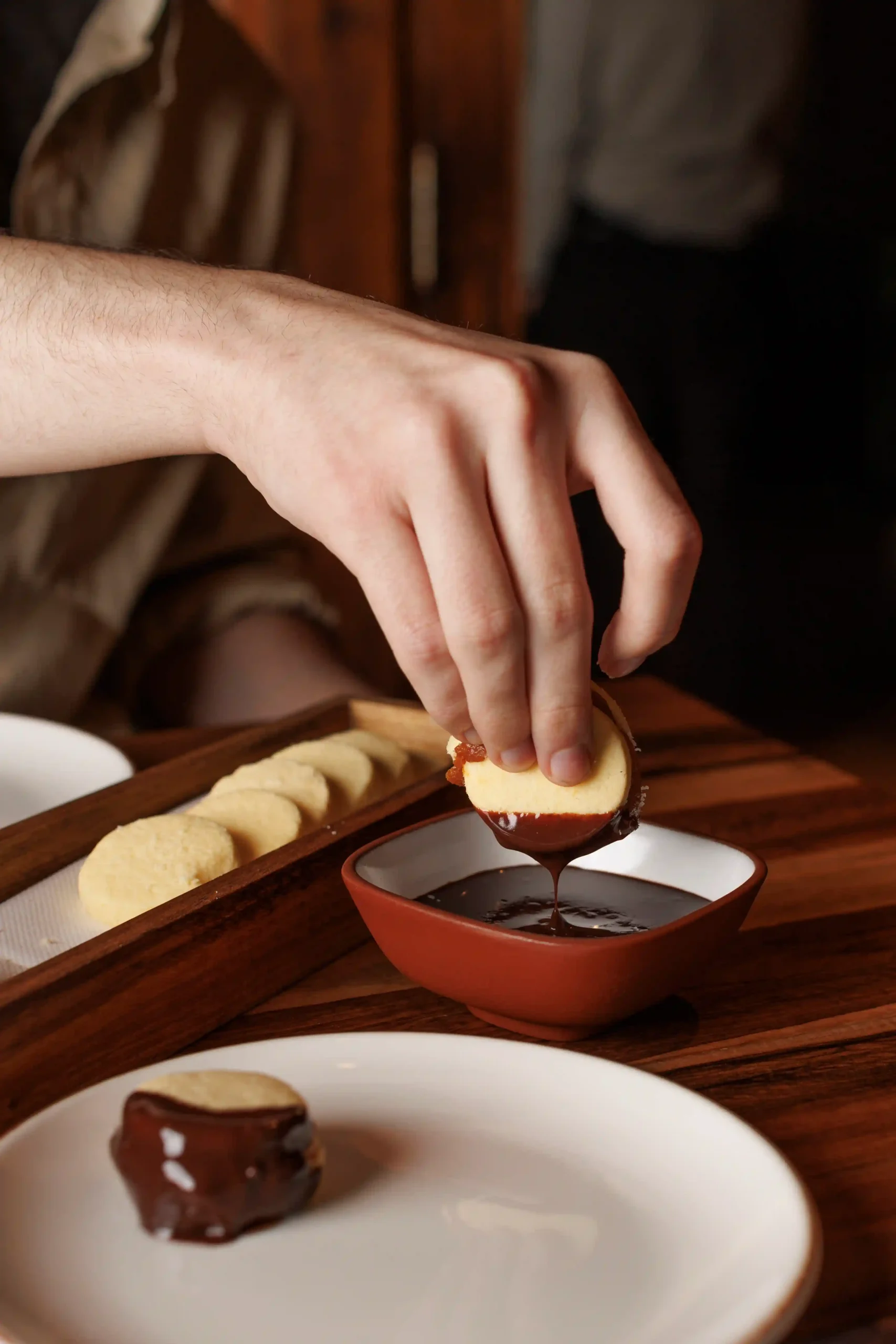 alfajor with melted chocolate